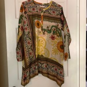 Beautiful tunic with fun dragon print